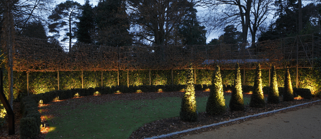 front garden lit with spiked spotlight and floodlights