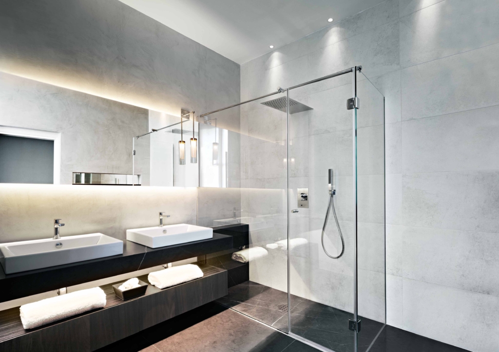 Contemporaru bathroom with floating mirror and basins