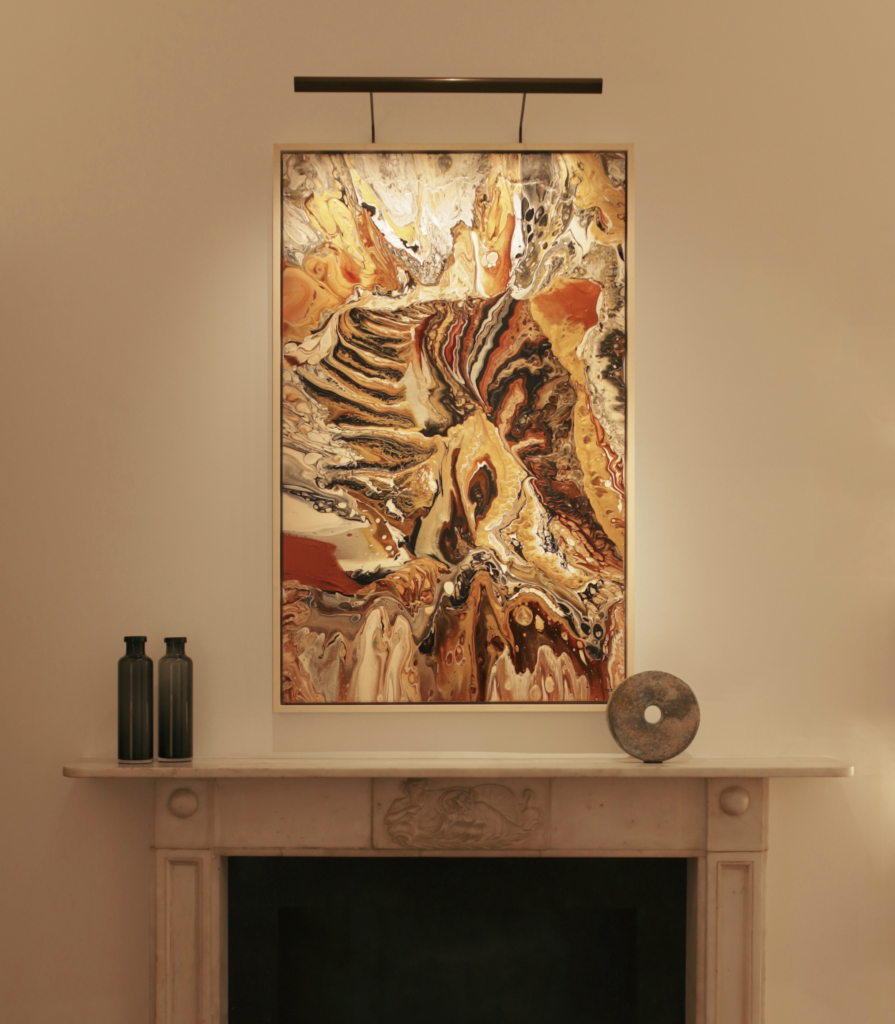 discreet picture light lighting art above fireplace