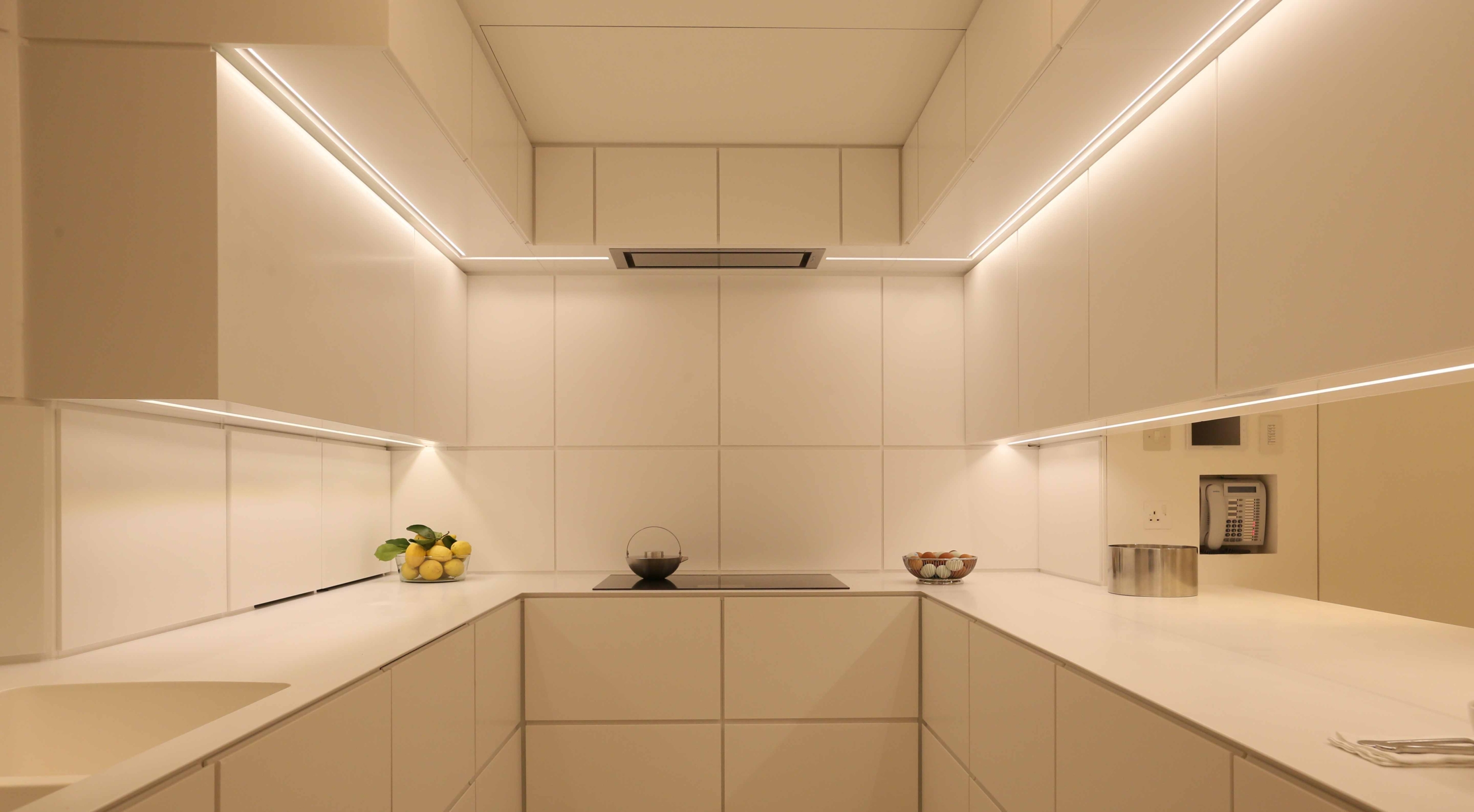 white kitchen with concealed led strip lighting