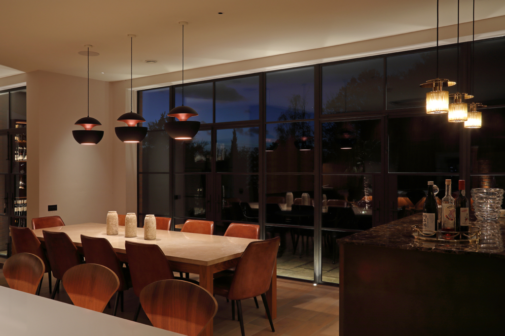 decorative lighting over dining table and bar