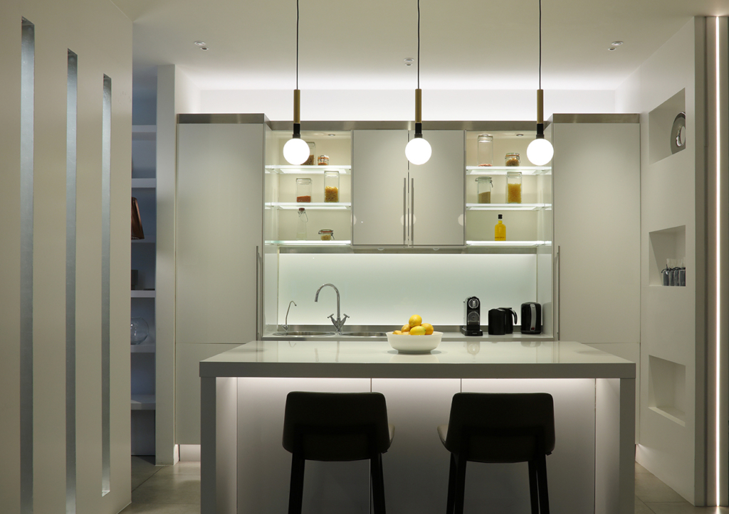 linear lighting integrated into contemporarykitchen