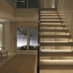integrated linear lighting into contemporary staircase