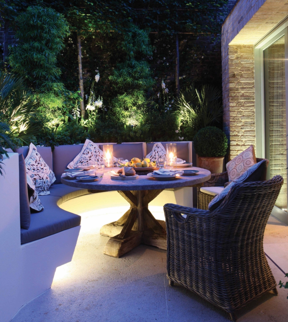 cosy alfresco dining with banquette and planting