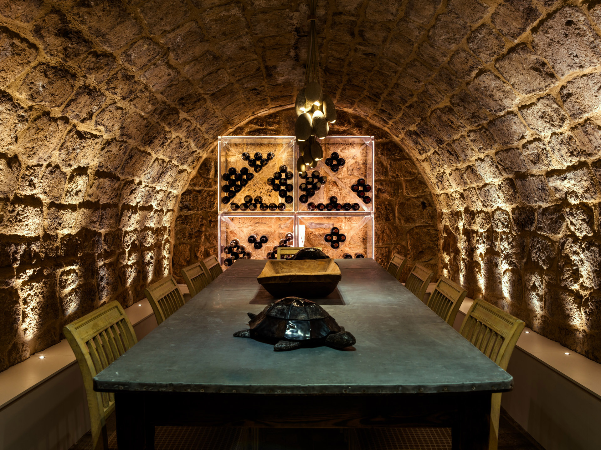 Curved wine cellar with uplights