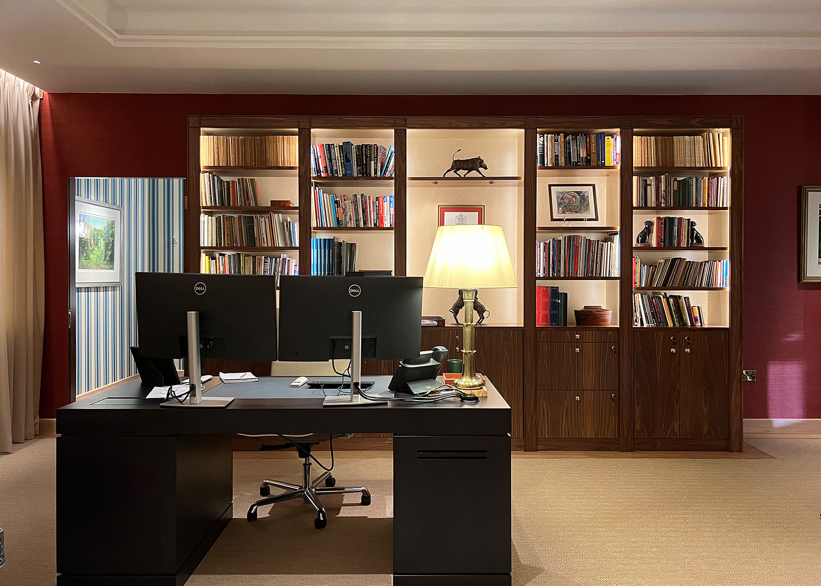 lit shelving in conservative executive office