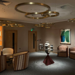 office reception with decorative pendants and moody lighting