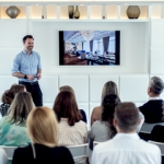 People listening to a lighting design masterclass in the John Cullen showroom