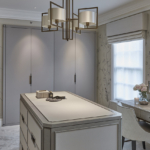 calming dressing room with central pendant and downlit wardrobes