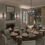 back lit shelving and exterior lighting around a dining table