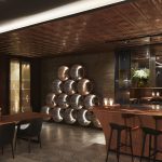 backlit whisky barrells in bar area of Dubai villa