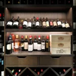 Wine cellar with bottles lit with linear LED Strip