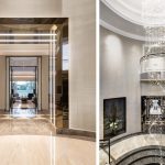 Dramatic hallway shot in villa with hanging chandelier and linear lit doorway