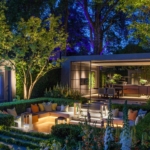 gold winning garden at chelsea flower show with sunken garden, TV screen, kitchen and layered lighting