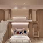 children's bedroom with slide and uplit bedhead