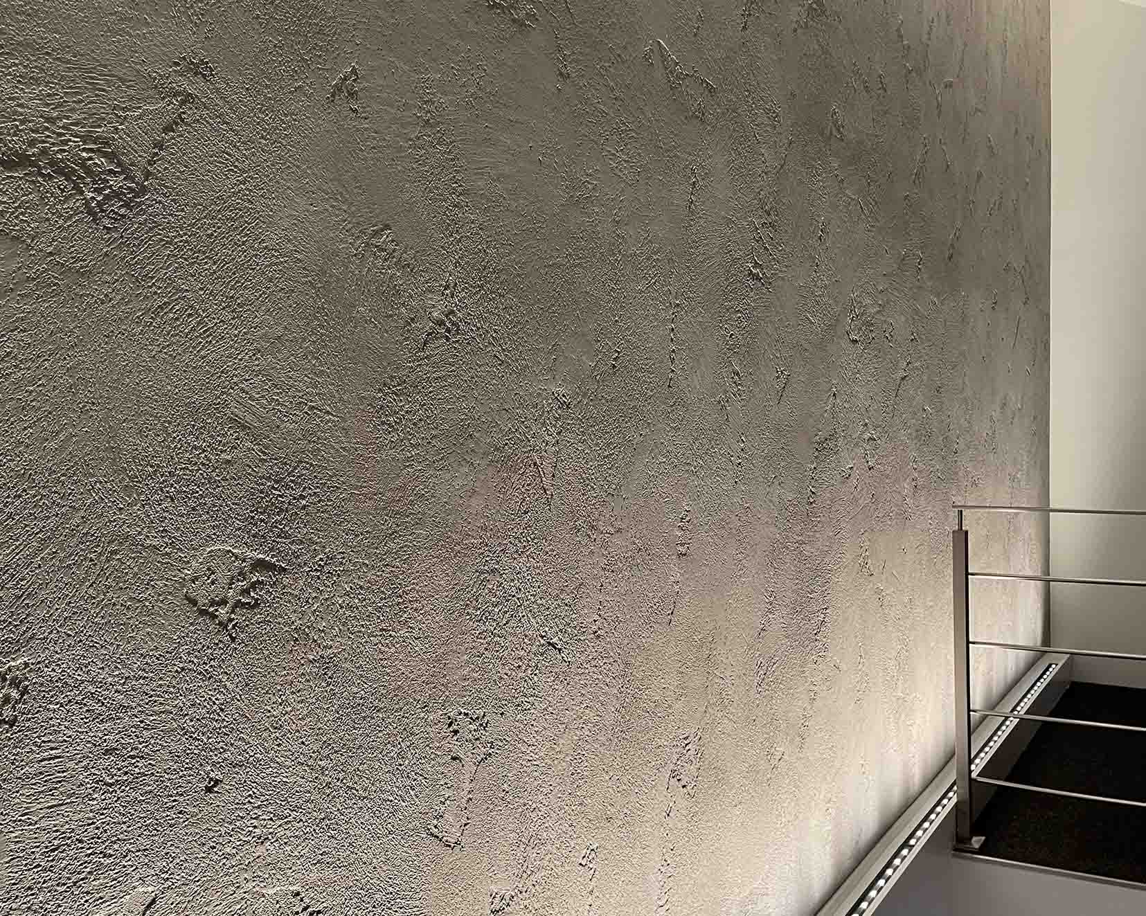 wall grazing with dedicated inground fitting evenly illuminating a textured concrete wall