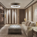 dressing room lighting ideas for a large dressing room with downlit cupboards and bespoke wallpaper panels