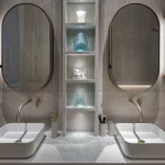 Double basins with mirrors and joinery lit in the middle