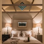 bedroom lighting ideas for uplit pitched ceiling