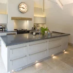 low level lighting in kick plinth of kitchen washing light over the floor