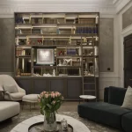 elegant living room with ceiling height joinery unit with lit shelving