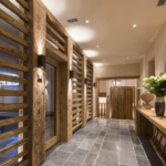 Wooden panelled hallway in chalet with downlights