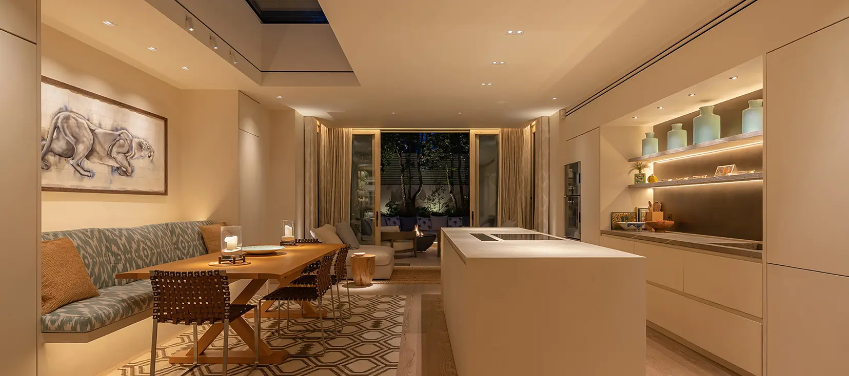 garden lit beyond the kitchen extends the feeling of space inside