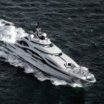 superyacht driving through waves