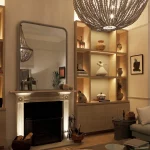 Uplit-fireplace-and-back-lit-shelving-John-Cullen-Lighting