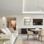 contemporary apartment with large chandelier over the dining table