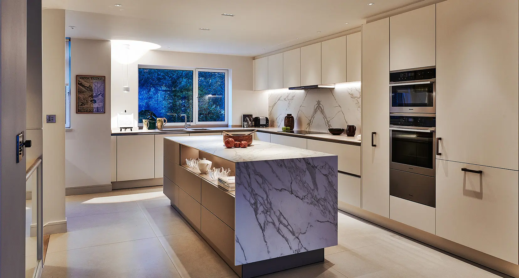 white marble kitchen with perfectly positioned downlights