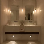 bathroom lighting ideas for double basin with hanging pendants and low level lighting