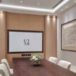 Board room with coffer ceiling lighting