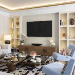 Living area of hotel with coving lighting