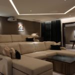 Luxury home cinema and games room with ceiling detail lighting