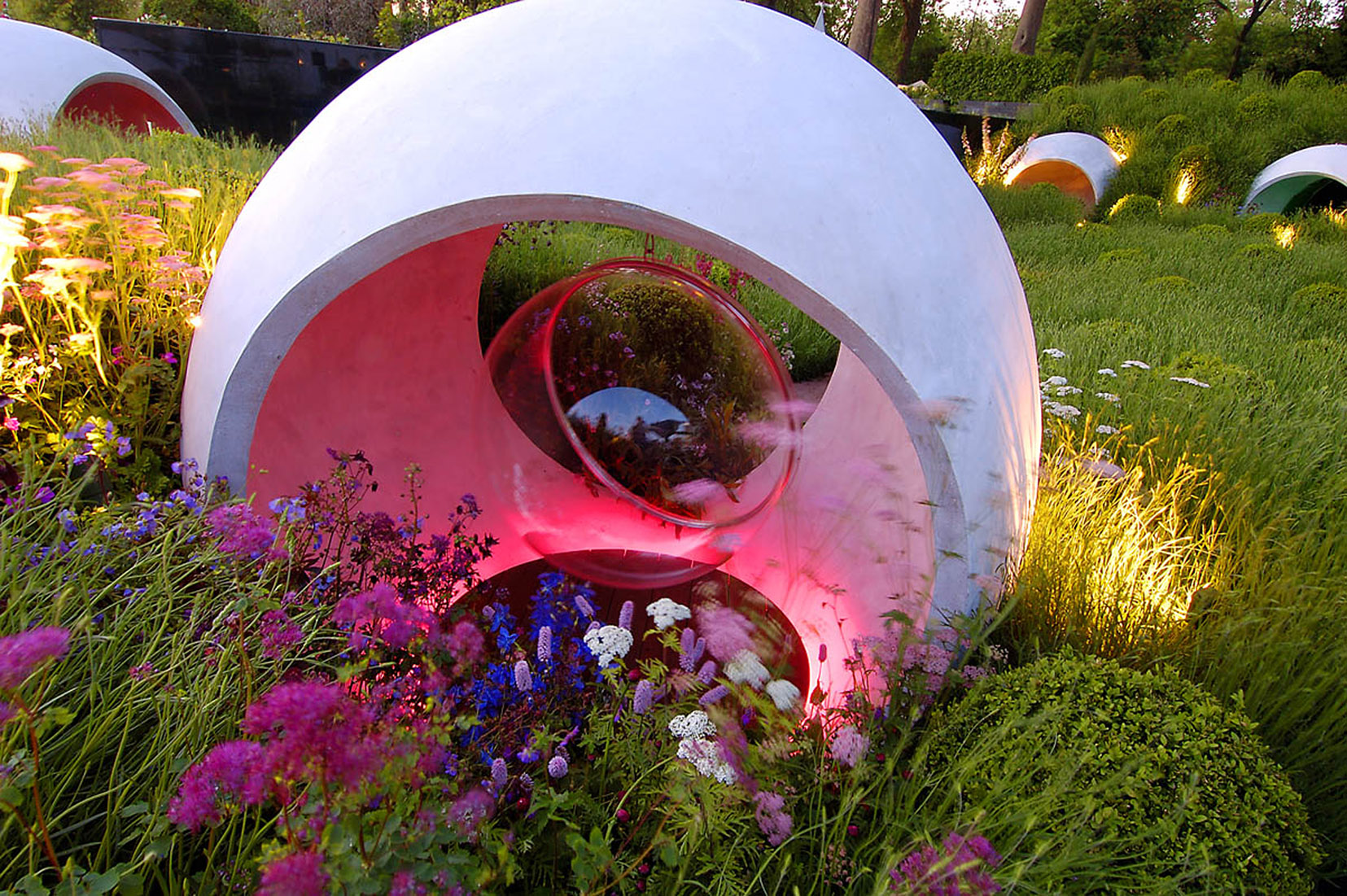 concrete sculpture structure with pink lighting inside