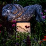 stone sculpture cross lit with Kew spike spotlights